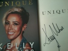 KELLY HOLMES DBE, SIGNED