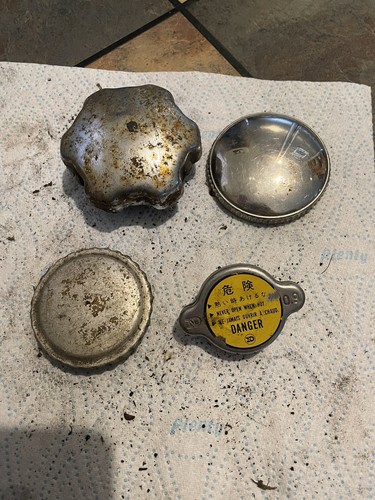 Old petrol can lids - old,