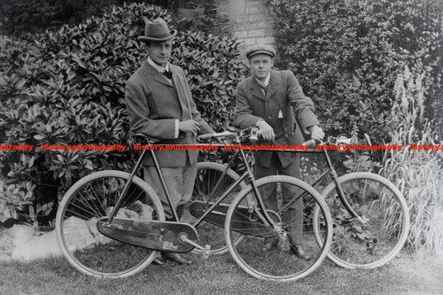 F024141 men with bikes - with, in