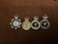 A COLLECTION OF VINTAGE LIVERPOOL CITY POLICE CAP BADGES X 4
