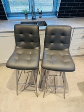 Two genuine grey leather bar stools from Fishpools