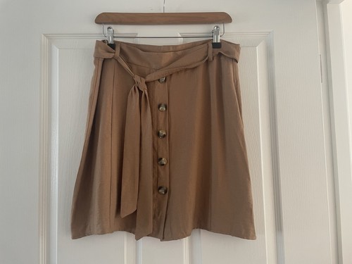 Select brown button through - ew,