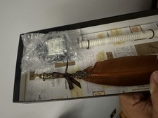 Brown pewter feather quill - feather,
