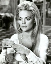 Dyan Cannon shows cleavage