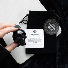 Black obsidian crystal skull - black,