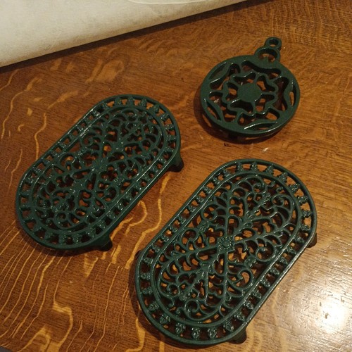 Vintage cast iron green trivet