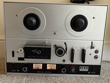 AKAI 4000D reel to reel Tape Player. Made In Japan. Turns On. Reels Turn !