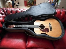 Left handed Martin OOOX 1AE electro acoustic with case