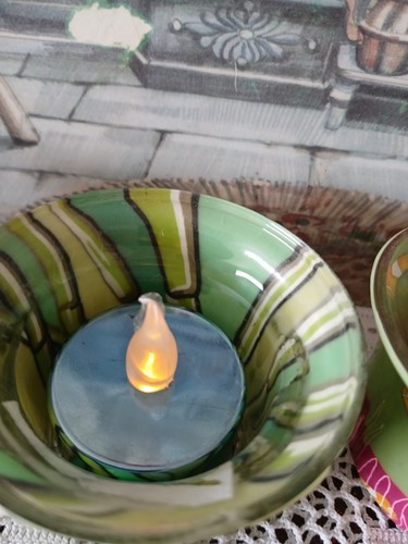 Three small tea light - three,