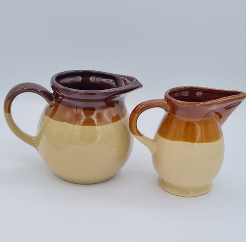 Earthenware salt glazed jugs - jugs, x