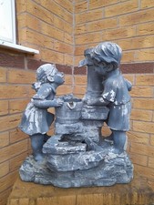 BOY AND GIRL WATER FEATURE ==