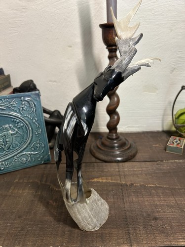 Horn carved sculpture an - horn, of