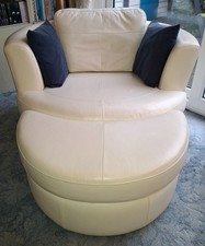 Large round swivel  cuddle chair and footstool. Excellent condition