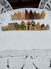 HANDMADE CERAMIC DECORATIVE HOUSES.