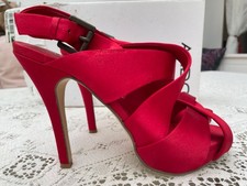 women high heel shoe . Both