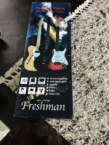 Freshman style guitar with - style,