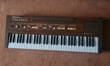ROLAND PIANO PLUS 11 ELECTRIC PIANO  woodgrain keyboard vintage
