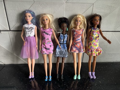 Barbie dolls with - barbie, outfits