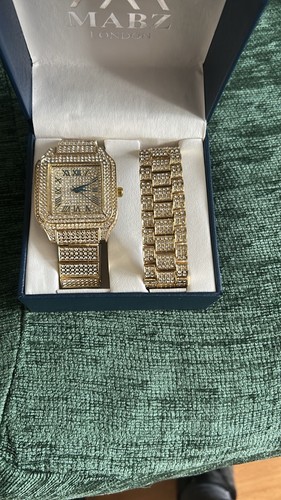 Gold and dimond watch - watch, is