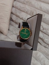 Gucci watch with green - with, dial