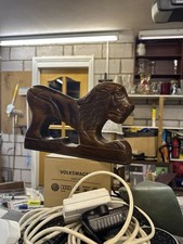 A Wooden Carved Lion Figurine