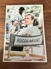 1975 S.T.I.G. Panini Top Sellers Superstars Stickers #61 Roger Moore James Bond