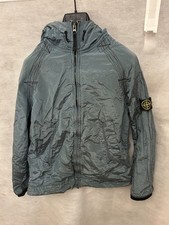 Boys' blue Stone Island jacket, age 12, good condition with flaw