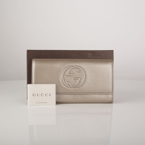 Gucci gold metallic leather - gold,