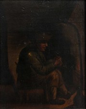 Antique portrait of a man, a blacksmith with a bellows