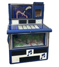 Rock Ola Juke Box converted into a fish tank, H 55 Inc, W 38 Inc, D25 Inc