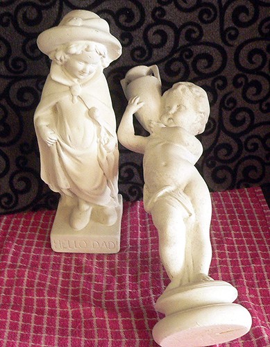 Pair tall plaster - of,