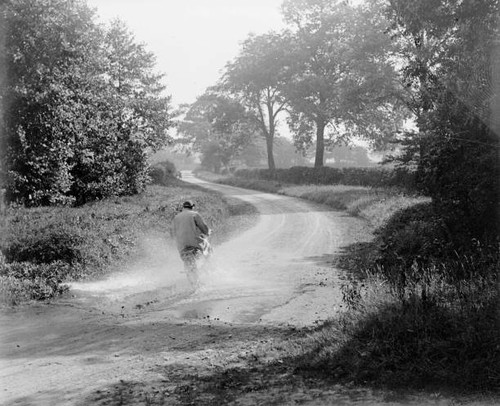 Motorcyclist tackles water