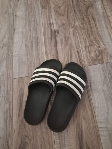 Adidas slippers worn - slippers,