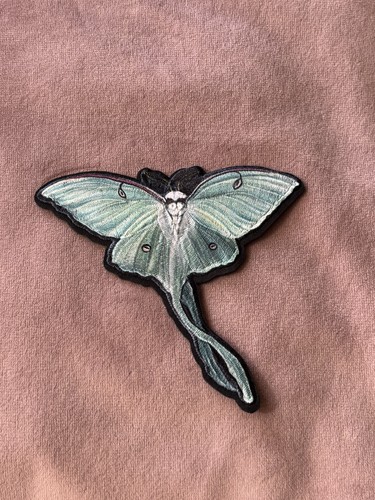 Iridescent luna moth
