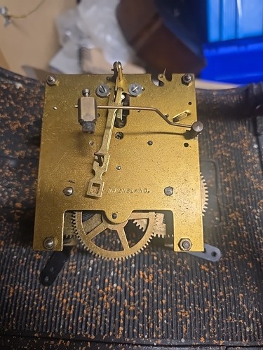 Clock mechanism for - mechanism, and