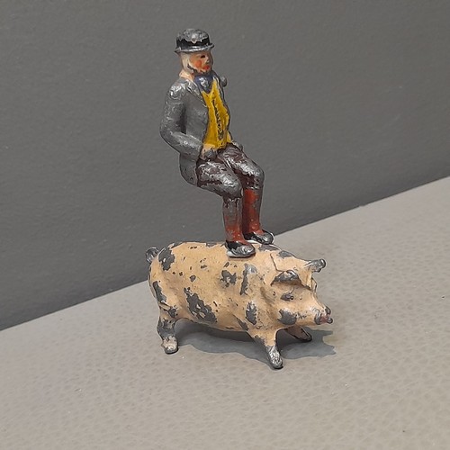 Vintage man pig lead figure - &,