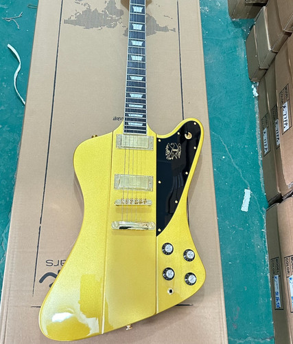 Firebird gold electric guitar - ,