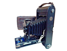 Vintage folding camera "Carbine" in leather case