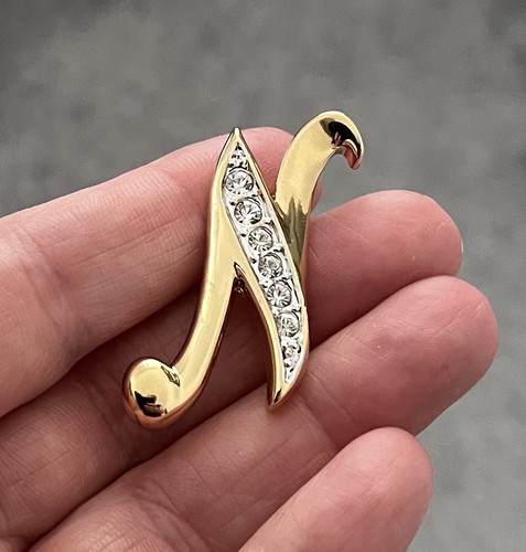 Gold tone letter - gold,