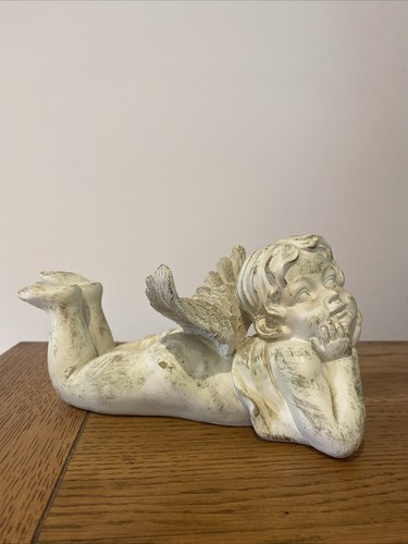 Cream gold lying down angel - lying,