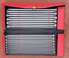 Vintage Aero knitting needle set in red clip case