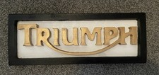 Carved Wooden TRIUMPH sign Man