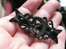 Victorian Gutta Percha Half Crescent Moon and Flower Brooch