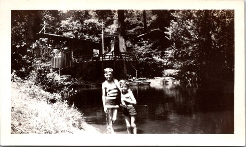 Two boys swimming river - swimming, by