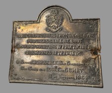 Vintage Embossed Metal Sign