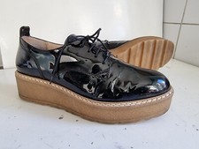 RUSSELL & BROMLEY DESIGNER