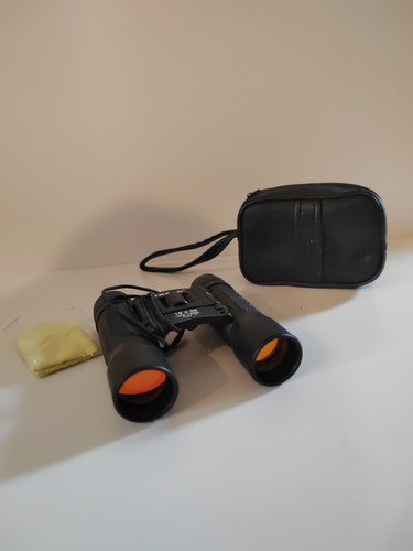 Tasco 10x25 compact binoculars - compact,