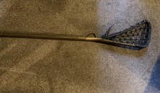 Lacrosse stick, vintage. Unbranded, wooden.  Has name of previous owner on.