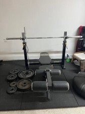 Powertec Olympic Workbench + Leg Curl Attach + 122kgs Iron Weights + 2 x Bars
