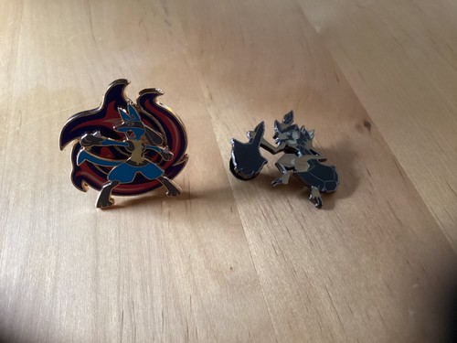 Two pokemon pin badges - two,